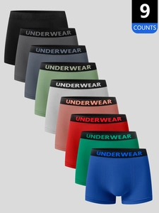 Detail of 9-pack men's athletic boxer briefs with various colors and lettered waistband