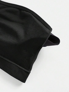 Macro shot of durable elastic fabric and precision stitching on seamless tube top