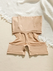 Dettagli della guaina modellante beige a vita alta con design push-up glutei