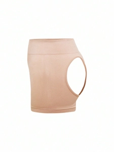 Detail view of high waist body shaper in beige with cutout design for butt lifting effect