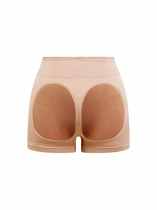 Macro detail of breathable honeycomb fabric on high-waist seamless tummy control shaper