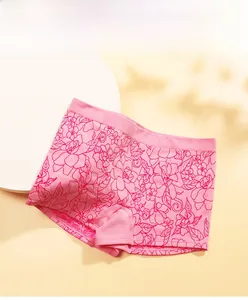 Detail of pink seamless boxer briefs for women with red floral jacquard patterns