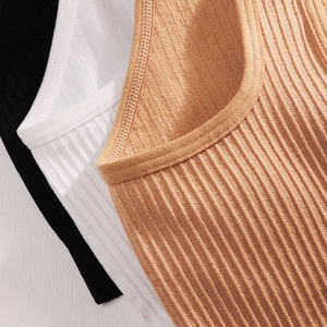 Seamless V-neck ribbed knit bralette in black white and camel tones with elastic texture