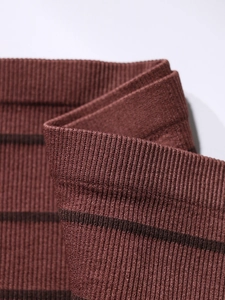 Macro view of ribbed knit fabric texture with coffee stripes for strapless bra