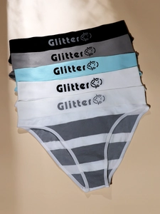 Detailed close-up of five seamless cotton panties with Glitter branding and star logos