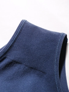 Detail shot of navy blue seamless panty showing fine knit texture and elastic edge