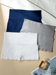 Three-pack of seamless high-waist slimming panties in navy blue, grey and white