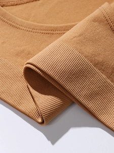 Macro detail of seamless leopard panties showing fine rib-knit texture and double stitching