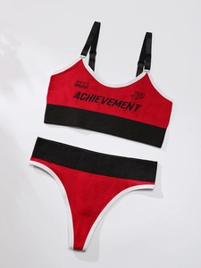 Red and black seamless sports bra and thong set with white piping and letter print