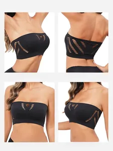 Detail view of seamless black bandeau with breathable hollow-out knit texture