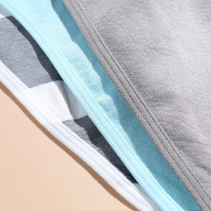 Close-up of 5-pack seamless glitter brazilian panties showing fine stitching and premium texture