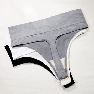 Three-pack of seamless high-waist thongs in grey, white, and black with elastic waistband