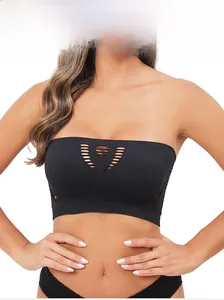 Detail of black seamless strapless tube top with laser-cut hollow-out pattern for women