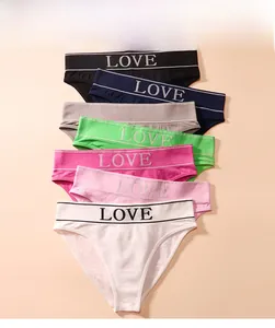 Close-up of seven assorted seamless cotton panties with LOVE lettered elastic waistband