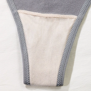 Seamless thong for women with reinforced cotton crotch and high-density stitching details