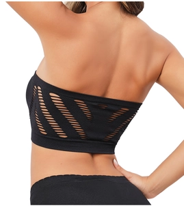 Close-up of black seamless ribbed tube top featuring laser-cut diagonal back cutouts