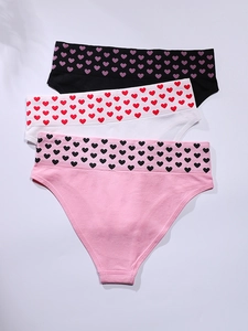 Set of 3 high-waisted seamless panties in black, white, and pink with heart pattern