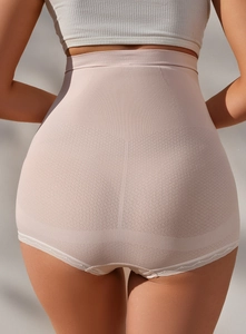 Detail of high-waist seamless maternity panties with lace trim and ribbed texture