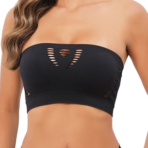 Black seamless hollow-out tube top with laser-cut stripe details for a minimalist look