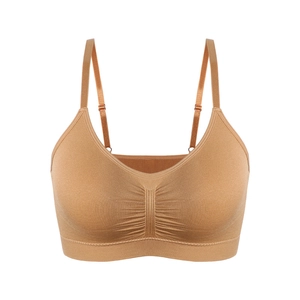 Seamless camel sports bra with adjustable thin straps and v-neck gathered front detail