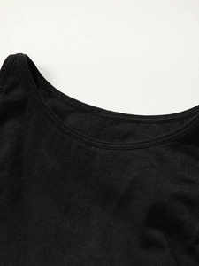 Close-up of black sports bra neckline with high-quality double-needle stitching detail