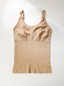 Detail view of seamless beige shapewear camisole with adjustable straps and ribbed compression