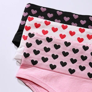 Three-pack of seamless high-waist panties with woven heart patterns and ribbed waistbands