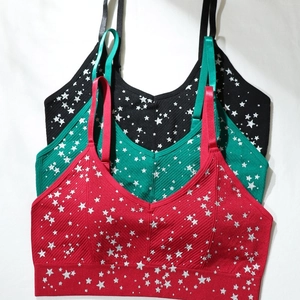 Set di tre reggiseni sportivi senza cuciture con stampa a stelle in rosso, verde e nero