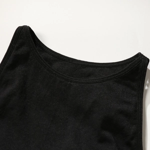 High-impact black sports bra with seamless knitting and reinforced crew neck stitching