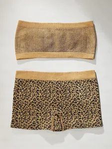 Set con top a fascia giallo a coste e slip con stampa leopardata e trama a maglia fine