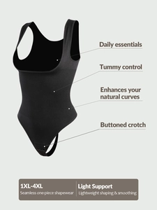 Detail view of seamless black shapewear bodysuit featuring tummy control ribbing and wide straps