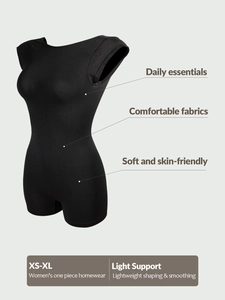 Detail view of black seamless short sleeve bodysuit featuring light support and smoothing effect