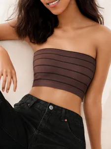 Detail of a dark brown striped bandeau top showing the ribbed knit texture and slim fit