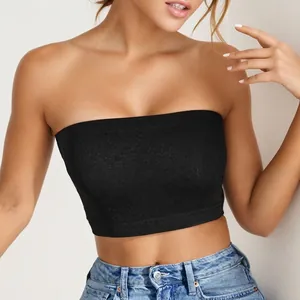 Black seamless strapless tube top bra with elastic fabric worn with denim jeans