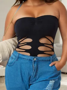 Detail showing black bandeau bodysuit with stylish multi-layer cut-outs on waistline