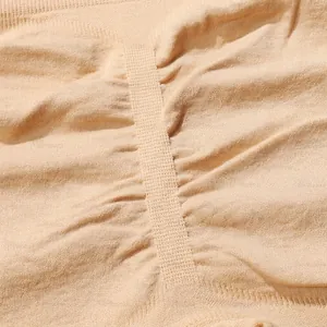 Women's high waist seamless beige shaping shorts with ruched butt lifting detail