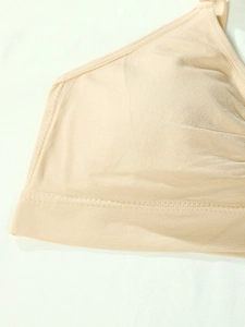 Detail of seamless plus size yoga bra with reinforced stitching and elastic fabric