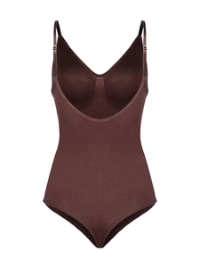 Detail of dark brown seamless bodysuit showing thin straps and V-neckline texture