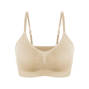 Seamless plus size sports bra with adjustable straps and center ruching in nude color