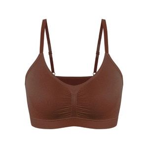 Detail of seamless plus size brown yoga bra with adjustable thin straps and ruching