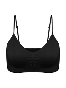 Detail of black seamless bralette with thin adjustable straps and ribbed elastic band