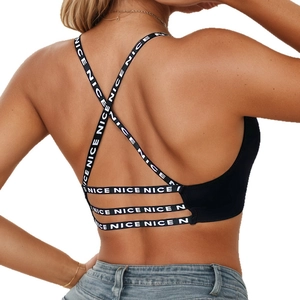 Reggiseno sportivo nero con spalline incrociate e scritta NICE per fitness e yoga