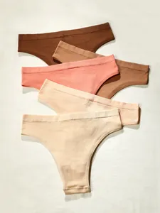 Detailed close-up of 5-piece seamless ribbed knitted thongs in various earth tones