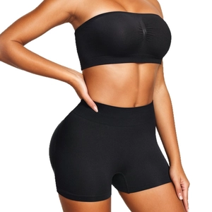 Seamless black tube top and high waist shaping shorts set for women sports or lounge