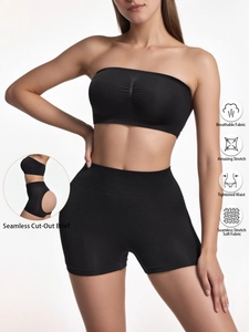 Detail of high-waist seamless shorts with cut-out design and breathable fabric texture