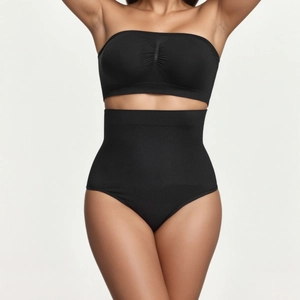 Detail view of seamless black two-piece shapewear set with high waist compression shorts