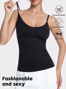 Detail view of seamless black camisole with thin straps and soft breathable fabric