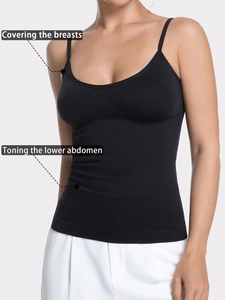 Detail showing supportive breast coverage and high-compression tummy control on black vest