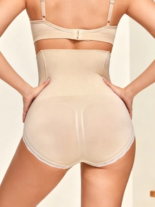 Rear view of high-waisted shaping underwear with tummy control and lace trim detail