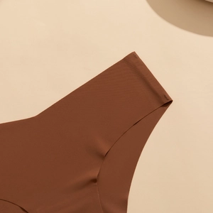 Close-up of seamless dark brown underwear showing smooth fabric and laser-cut edges